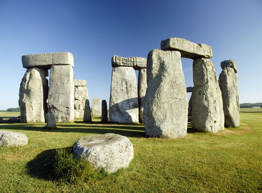 From London: Stonehenge, Windsor and Salisbury Guided Tour - Stonehenge on Salisbury Plain: monoliths, theories, and smart photo timing