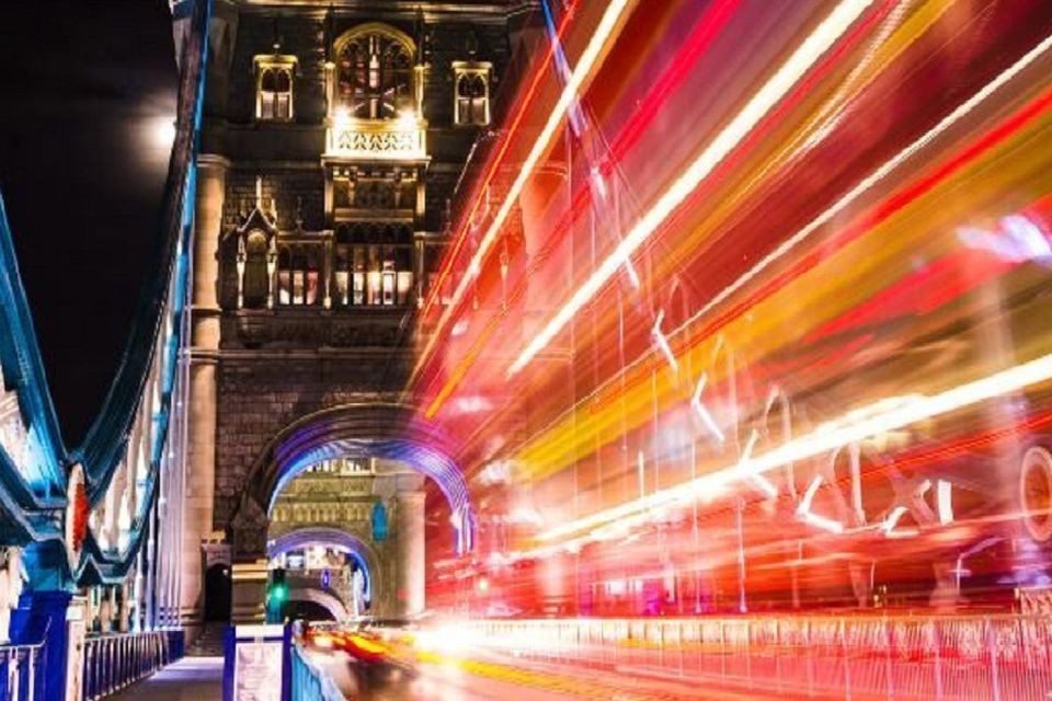 London: Tootbus London by Night Bus Tour - Parliament and Big Ben after dusk